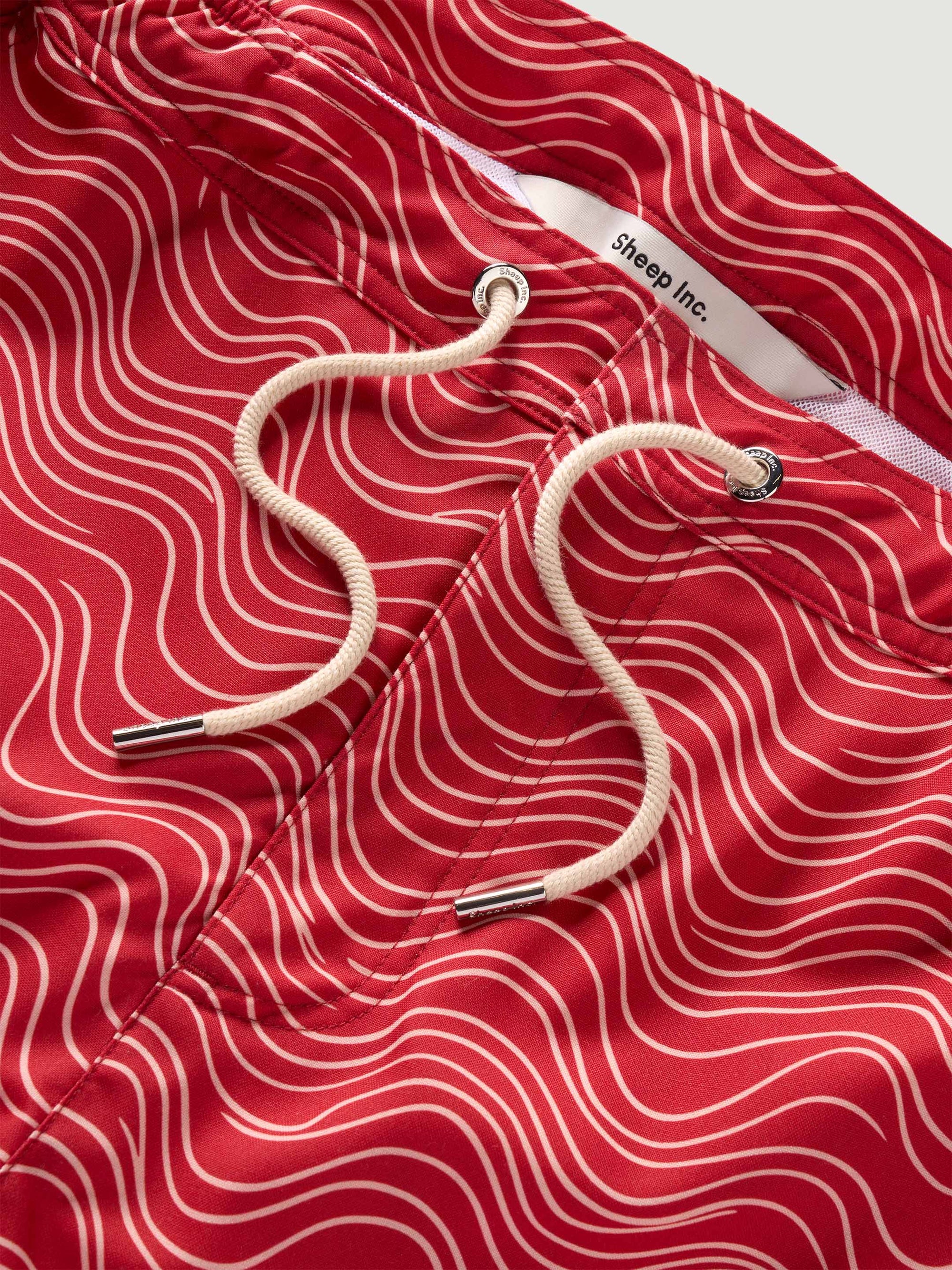The Merino Swim Shorts - Crimson Current